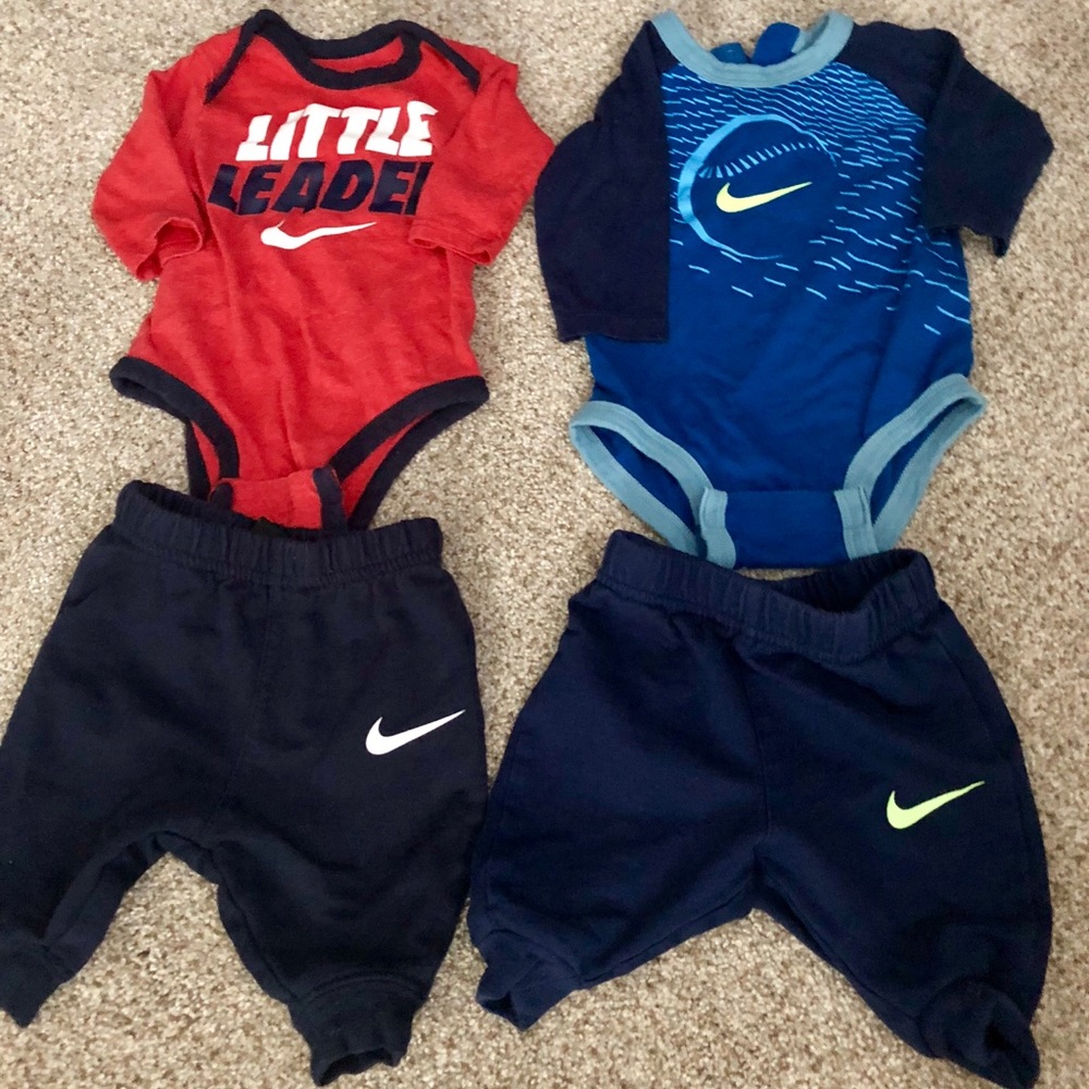 Two Nike 0-3 month outfits